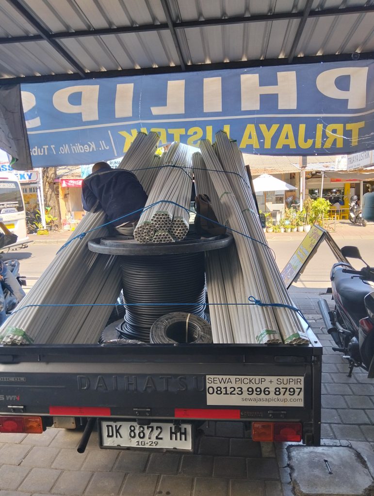 Sewa pickup Denpasar angkut perlengkapan listrik full sekali jalan